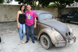 The only car in the car park at the teachers' meeting in Maracaibo, with its proud owners. Missionaries of the Sacred Heart, MSC Missions, Misioneros del Sagrado Corazon, MSCs in Venezuela, MSCs in Maracaibo, Maracaibo Venezuela, missionary work in Venezuela, MSCs in Caracas, missionary work in Caracas, missionary work in Maracaibo, Fr Michael O’Connell MSC, Fr Michael O’Connell Cork, Fr John Jennings MSC, Fr Vincent Screene MSC, Venezuela crisis